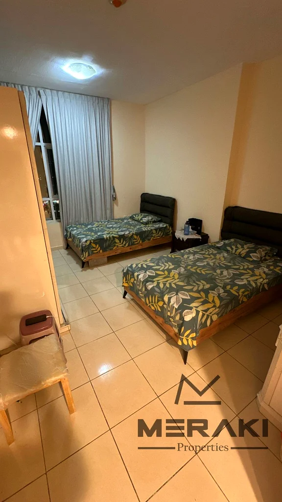 An apartment with two rooms and a living room at a very good price, a super lux finish in the Orient Towers in the heart of Ajman with a beautiful are63867044796545114