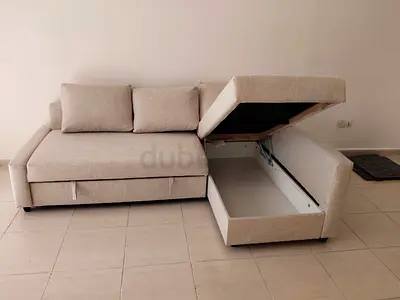 Ikea L Shape Sofa cum bed with big storage in L , and You can fix the L left and right any side