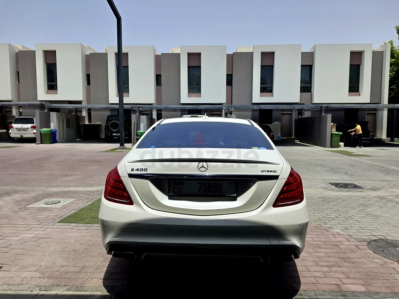 مرسيدس بنز S400 هايبرد – أبيض / بيج – 100,000 كم – حالة ممتازة63399932954625113