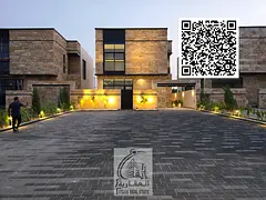 Villa for sale directly from the owner in Al Zahia with a 20-meter front setback and a stone façade