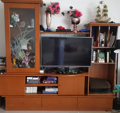 URGENT SALE: Extendable Wooden Entertainment Center with Storage