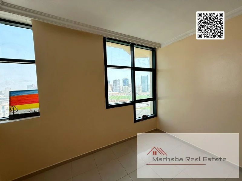 بيع شقة 2 غرفة نوم في برج رشيديه عجمان الإمارات 390,000/-درهم إماراتي بإطلالة على البحر والملعب63888603524355111