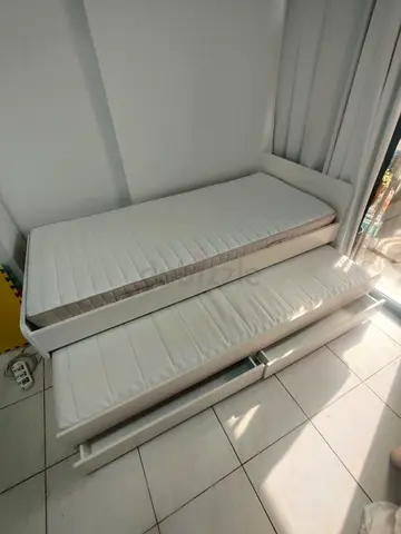 Ikea slakt bed frame with under bed and 2 storage drawers underneath with 2 Ikea mattresses