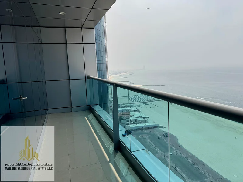 شقة فاخرة بغرفتي نوم ومطبخ مفتوح وإطلالة جزئية على البحر63871086642947114