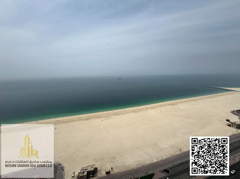 شقة فاخرة بغرفتي نوم ومطبخ مفتوح وإطلالة جزئية على البحر63871086642947111