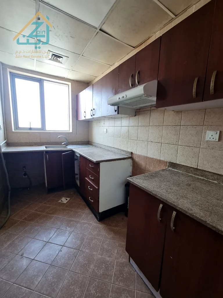 🏡 شقة واسعة مكونة من غرفتي نوم وصالة للإيجار في جاردن سيتي، عجمان 🏡63708147688579114