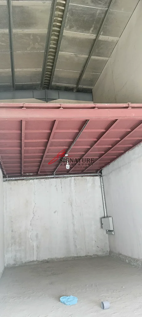 New warehouse, 600 sqm ground floor, 400 sqm mezzanine, 13 KVA three-phase electricity, for rent in Industrial Area 2, Ajman63402798252547112