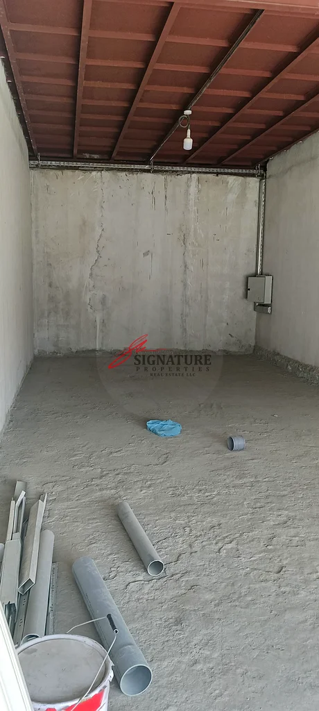 New warehouse, 600 sqm ground floor, 400 sqm mezzanine, 13 KVA three-phase electricity, for rent in Industrial Area 2, Ajman63402798252547111