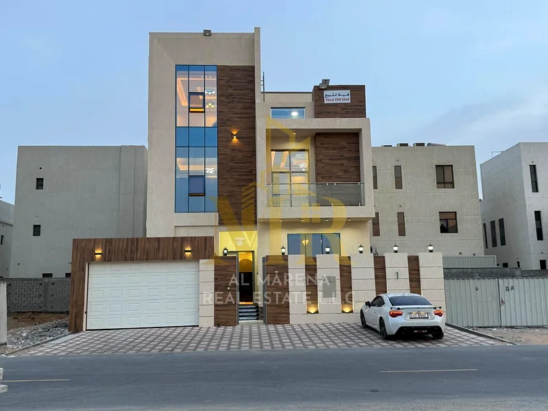 🏡 For Sale – Luxury Villa in Al Bahia – Ajman | 2 Floors + Roof | 6 Master Bedrooms | Majlis + 3 Living Rooms | 3 Modern Kitchens | Maid’s Room | Roo63883873122179110