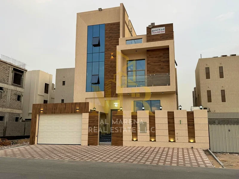 🏡 For Sale – Luxury Villa in Al Bahia – Ajman | 2 Floors + Roof | 6 Master Bedrooms | Majlis + 3 Living Rooms | 3 Modern Kitchens | Maid’s Room | Roo63883873122179112