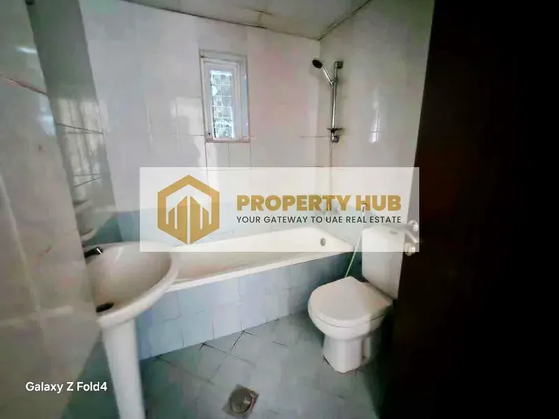 🏡 العنوان: للبيع: شقة مكونة من غرفة نوم واحدة مؤجرة في برج أورينت، عجمان - 985 قدمًا مربعًا مع موقف سيارات! 🏡63867044638595114