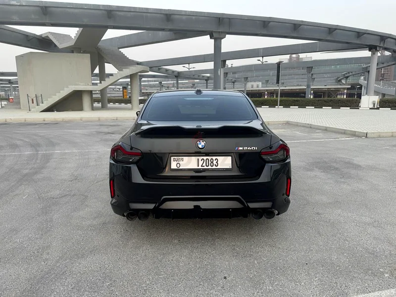BMW M240i with black package, and unique black/blue interior, upgraded spoiler and exhaust tip.63410194617217113