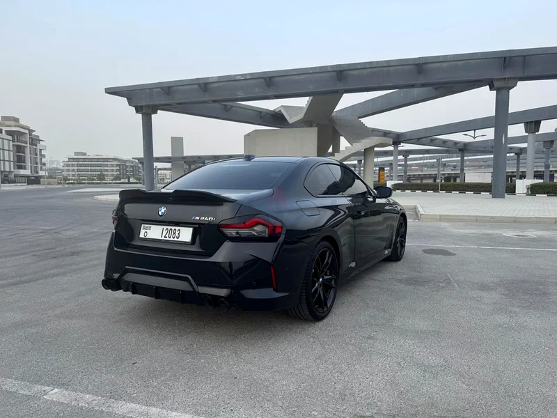 BMW M240i with black package, and unique black/blue interior, upgraded spoiler and exhaust tip.63410194617217111