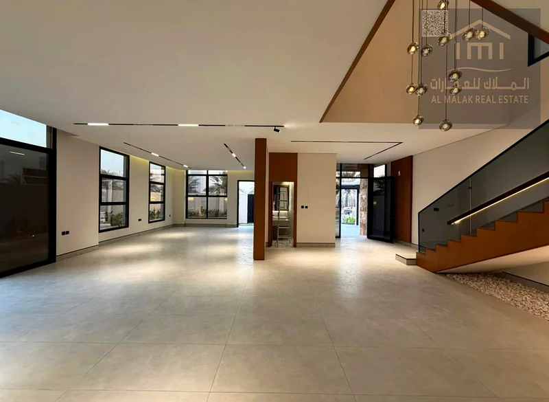 Luxury villa, Al-Alia area, the facade of a stone, a modern entrance, an external and internal landscape, a very special location63873450920067112