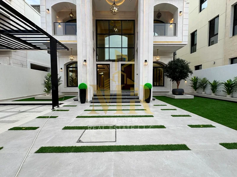 🏡 For Sale – Spacious Villa in Al Bahia – Ajman | 4,225 sq. ft. | 2 Floors + Roof | 5 Master Bedrooms | Majlis & 2 Living Rooms | Front Yard with Sea63884374999939113