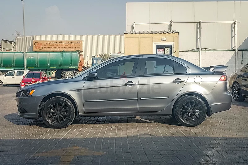 سيارة مفتشة | ميتسوبيشي لانسر EX GLS 2015 | مواصفات خليجية | الرمز #35066963398579342339114
