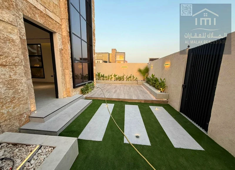 Luxury villa, Al-Alia area, the facade of a stone, a modern entrance, an external and internal landscape, a very special location63873450920067111