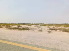 For sale, a corner plot of land in Industrial Area 13 in Sharjah, with an area of ​​39,000 squar