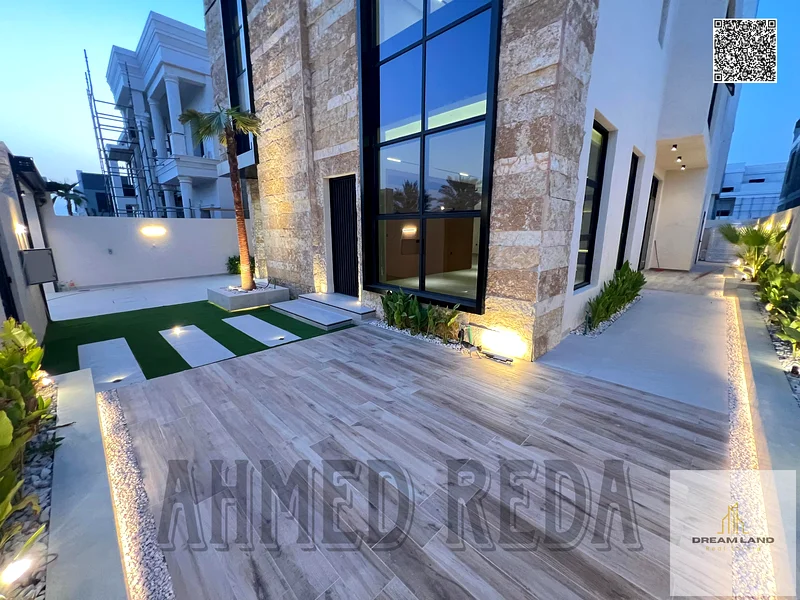 Villa - Two floors & large courtyard including fees - Close to Sheikh Mohammed bin Zayed Road - Freehold for all nationalities for life - With the pos63872045452803111