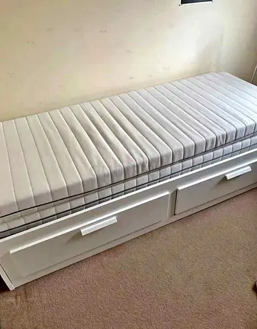 IKEA brimness Day bed with 2 storage drawers underneath and with 2 IKEA mattresses