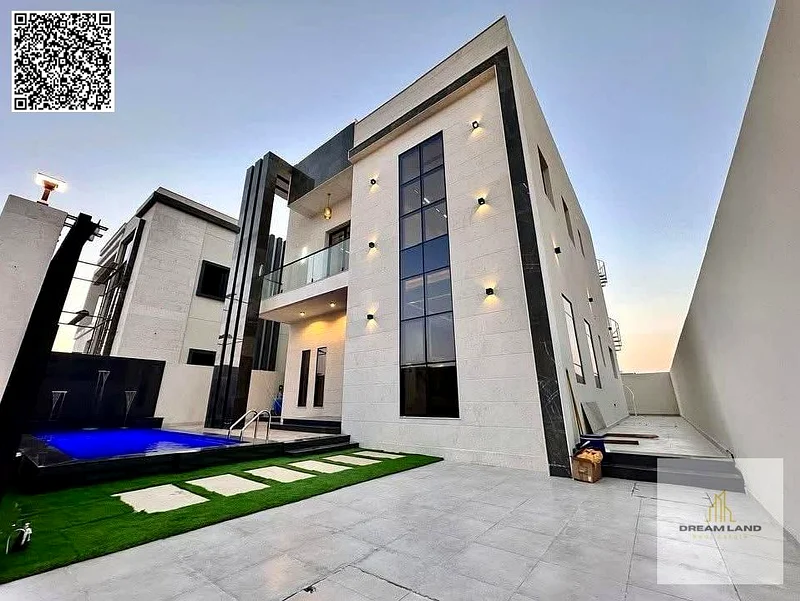 For sale - a luxury villa with a swimming pool in a prime location in Ajman, high-end finishing, modern design, including registration and a swimming63891577386114111
