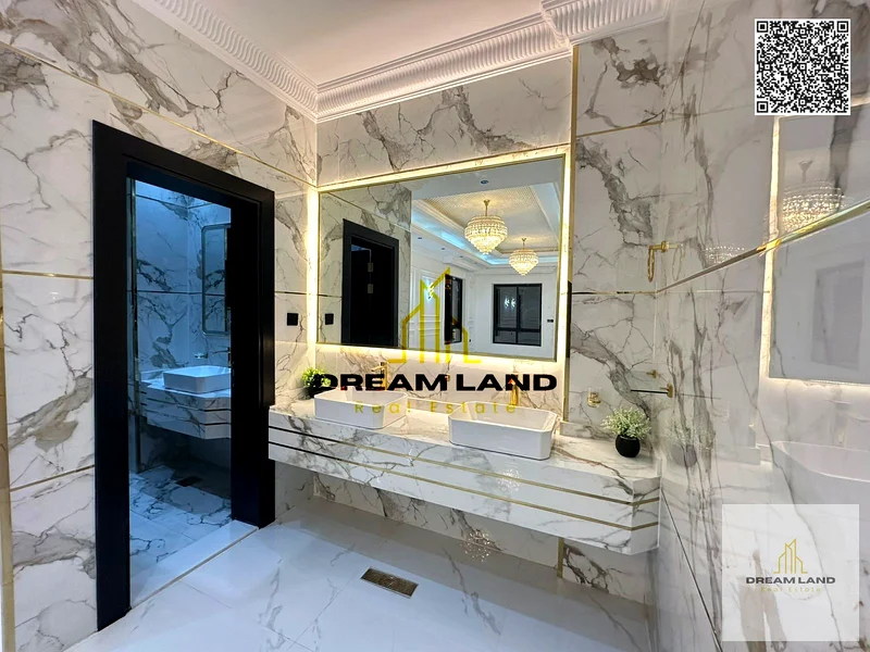 Luxury super deluxe villa for sale in Al Helio 2 area in Ajman, freehold for all nationalities, at a price including registration fees63893559763331113