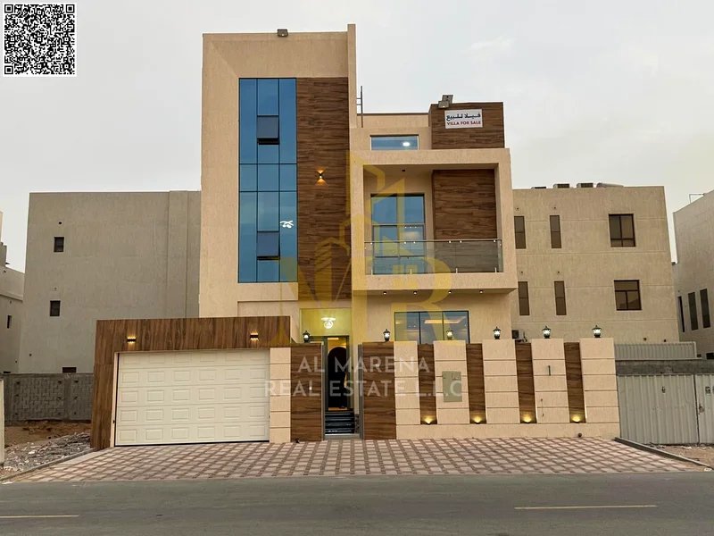 فيلا بسعر شامل، بما في ذلك التسجيل والملكية، على الشارع الرئيسي، جاهزة للسكن في أكثر مناطق عجمان رقيًا. ف63881040096771112