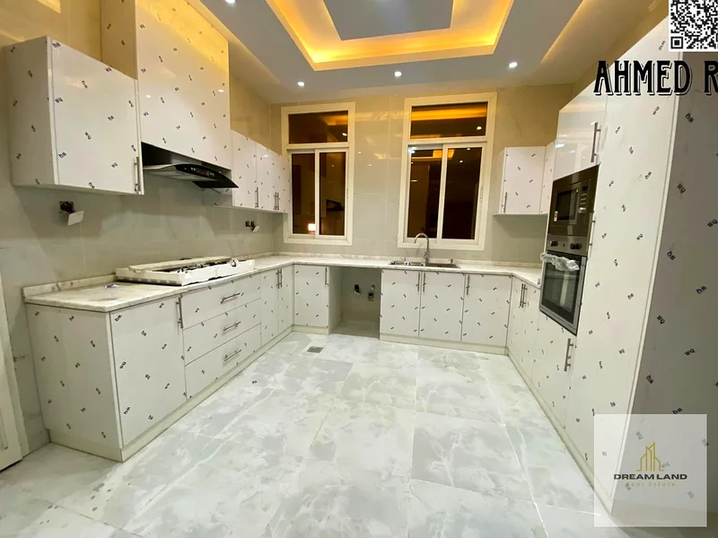For sale, a villa, including registration and ownership fees, directly opposite the mosque, two floors, stone facade, with the possibility of easy ban63891577421955114