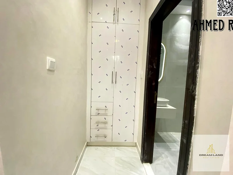 For sale, a villa, including registration and ownership fees, directly opposite the mosque, two floors, stone facade, with the possibility of easy ban63891577421955113