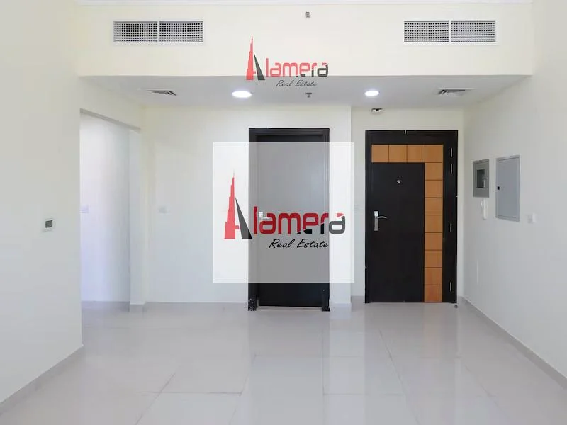 شقة واسعة من غرفة نوم واحدة مع شرفة | بالقرب من محطة المترو الجديدة | مطبخ مغلق | عائد استثماري مرتفع يصل إلى 8-9٪63993359191938113