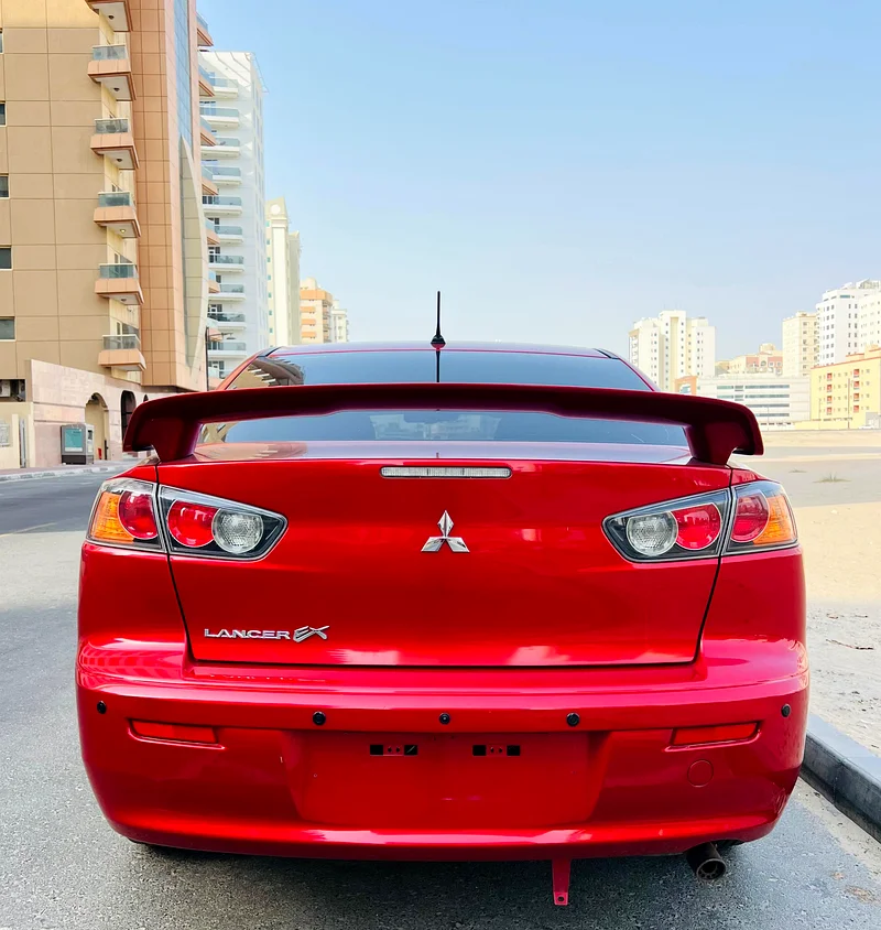 MITSUBISHI LANCER 2016 MODEL RED GCC SPECS LESS KM REF.045463398582144769113