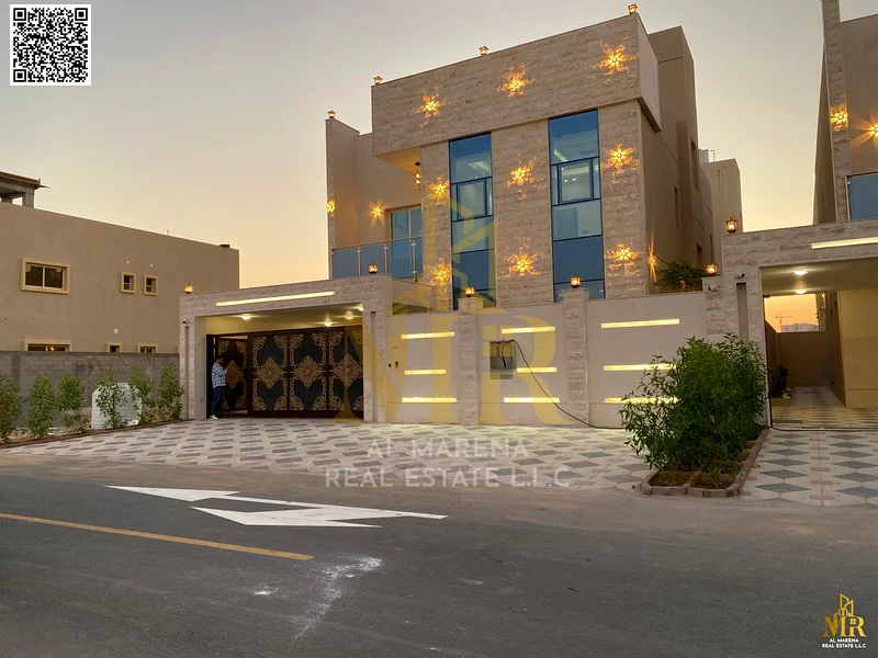 A villa, including registration and ownership fees, including water and electricity, with personalized finishing, for sale in Ajman, freehold. The vil63904570193538111