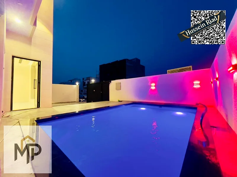 Luxury modern villa for sale in Al Helio 2 - Ajman | High-end finishes and a prime location! With a swimming pool, registration fees included.63895689395073110