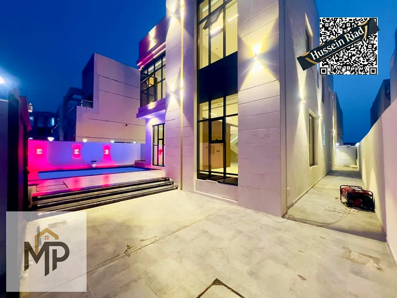 Luxury modern villa for sale in Al Helio 2 - Ajman | High-end finishes and a prime location! With a swimming pool, registration fees included.63895689395073113