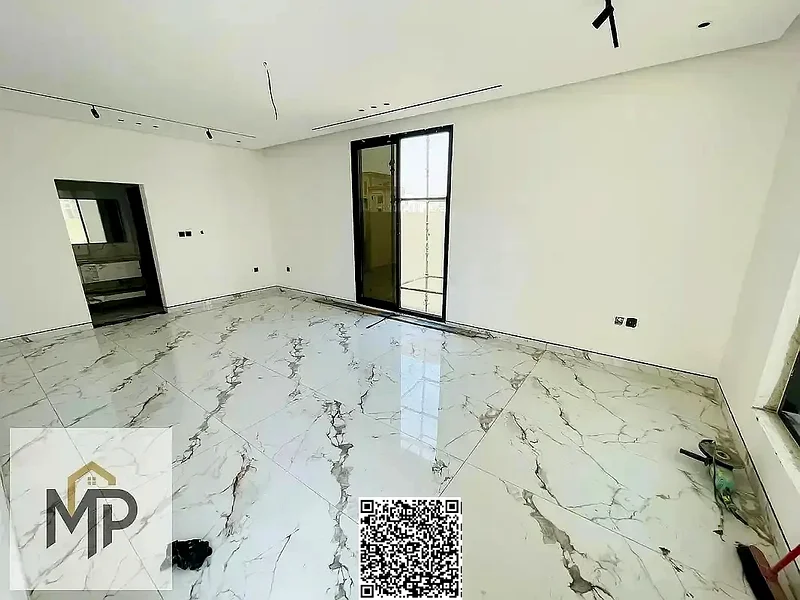 For sale - a luxurious villa in Al Bahia, Ajman, in a prime location close to all services. Price includes registration fees.63880932788099114