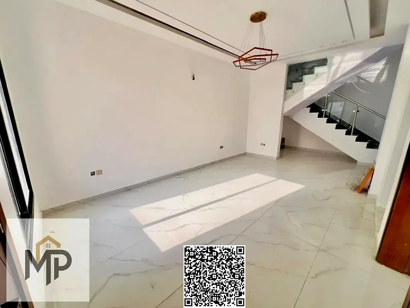 Distinctive villa for sale in Al Helio - Ajman, strategic location close to all services, schools and mosque63894218740738113