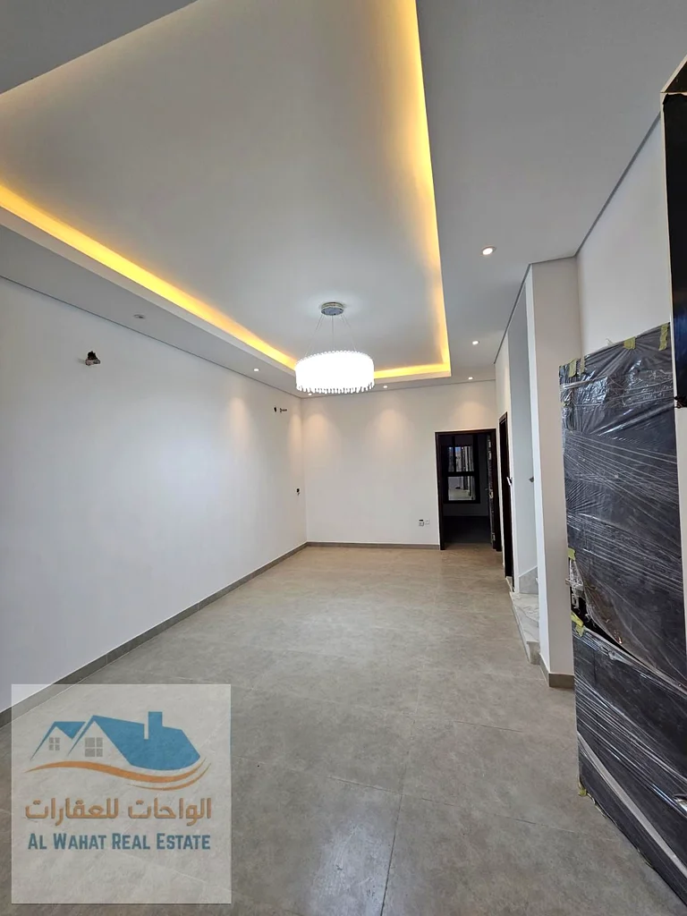 A townhouse villa for sale directly from the owner in Al Helio 2, Ajman, in a prime location close to Azha Community, with a 9-meter front setback fro63912467227523111