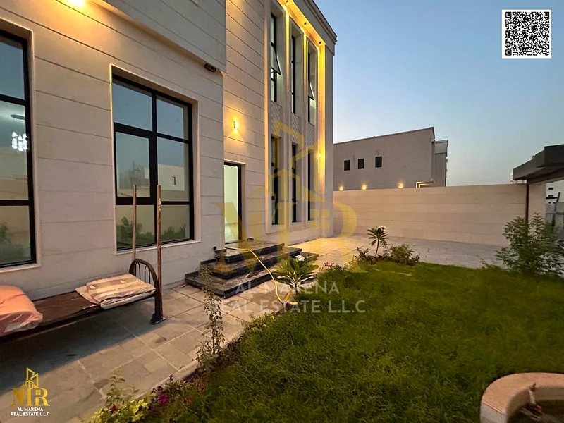 Villa for sale - two floors and a roof, barbecue area, and a large courtyard - close to Sheikh Mohammed bin Zayed Road - freehold for all nationalitie63872558047363114