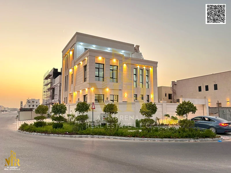 Villa for sale - two floors and a roof, barbecue area, and a large courtyard - close to Sheikh Mohammed bin Zayed Road - freehold for all nationalitie63872558047363111