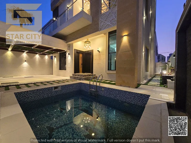 Luxury villa with a swimming pool, waterfall and rooftop seating area in Al Helio 2 at an attractive price63914319012483112
