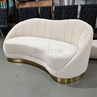 Elegant Curved Sofa with Gold Base