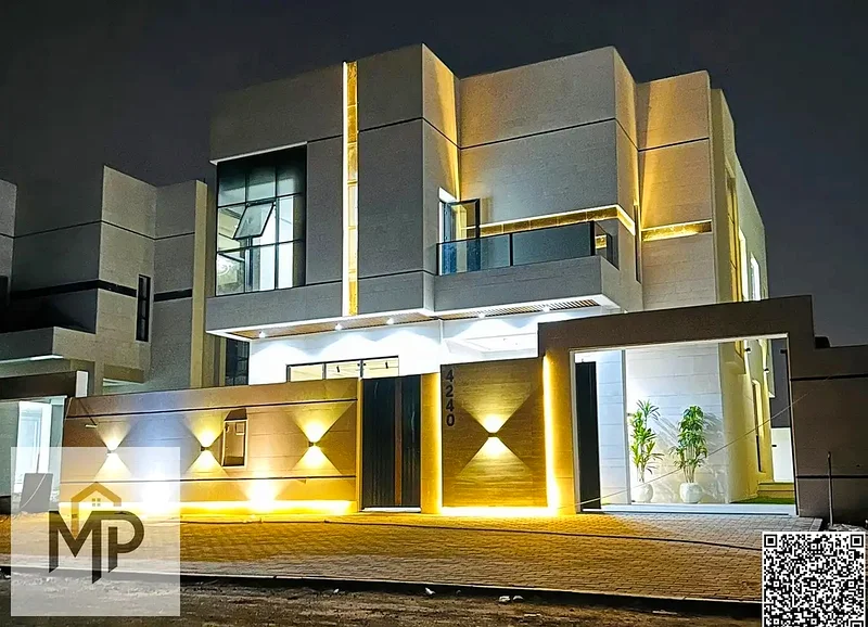 For sale, a modern villa with a stone facade, including registration fees, close to the mosque and services, with a swimming pool.63895812650370112
