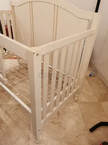 Elegant White Crib for Your Little One