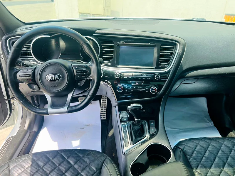 Kia optima full option63488875413634113
