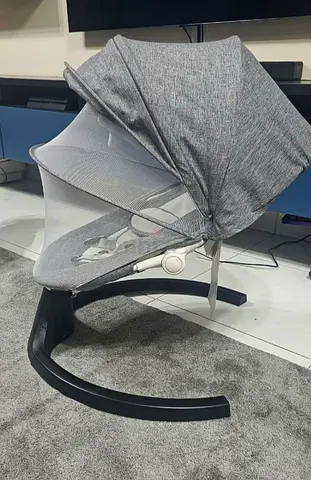 Baby swing with a dining table still new