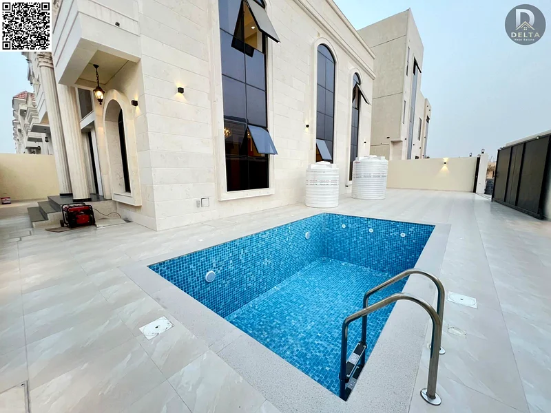 For Sale | Luxurious Corner Villa in Al Helio, Ajman, Super Lux Finishing + Private Pool. Prime Location: Opposite the Azhi Project - Near the Sharjah63894745471106114