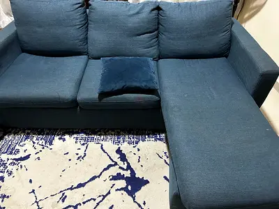 Stylish Blue Sofa with Chaise Lounge - Perfect for Your Living Room!
