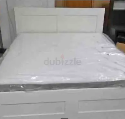 IKEA brimness queen size bed with 4 storage drawers underneath and with  IKEA mattress