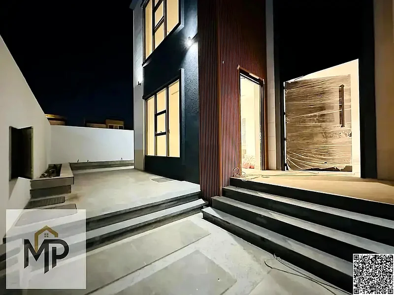 Villa for sale - two floors and a large courtyard - close to Sheikh Mohammed bin Zayed Road - freehold for all nationalities for life63880618952451113