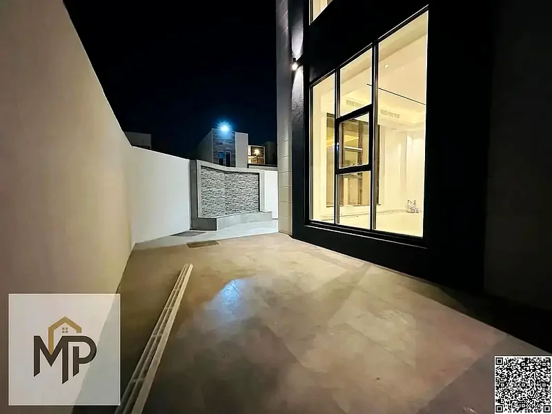 Villa for sale - two floors and a large courtyard - close to Sheikh Mohammed bin Zayed Road - freehold for all nationalities for life63880618952451114